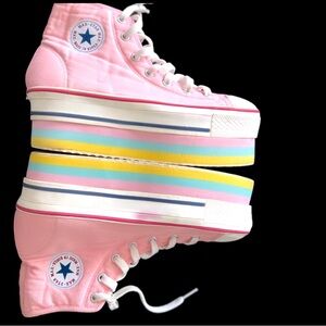 Pink platform sneakers will fit a size 8.5-9